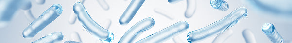Blue capsules on a light blue background