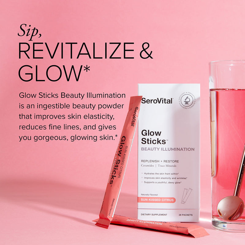 A box and packet of Glow Sticks next to a glass of water with a spoon in it. Glow sticks improves skin elasticity, reduces fine lines, and gives you gorgeous, glowing skin.