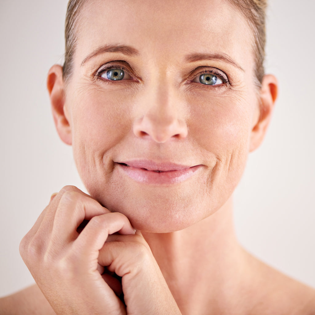 lady smiling glowing skin