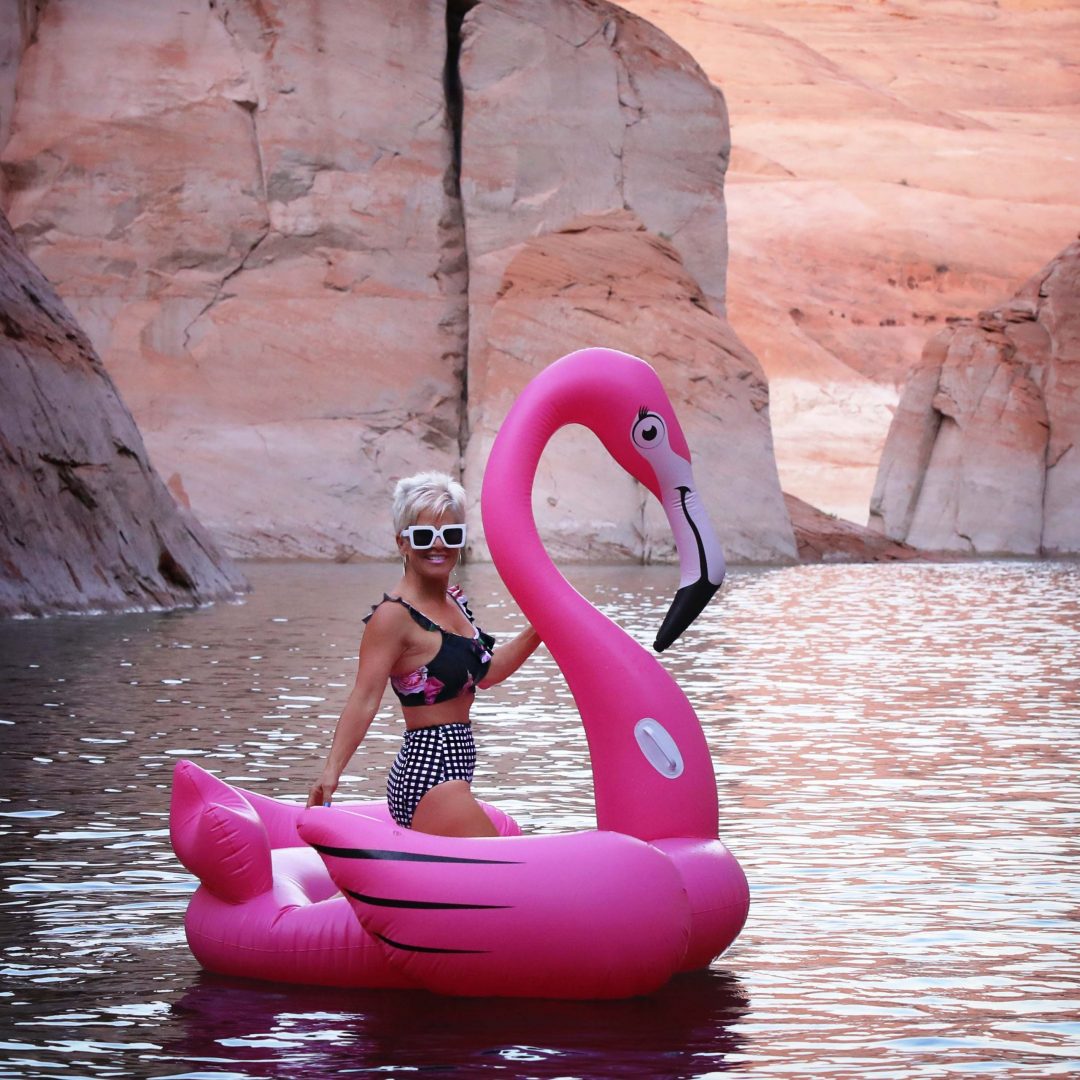 Woman floating on lake