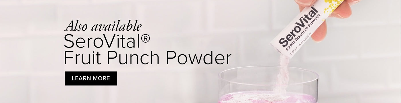 A packet of HGH-boosting SeroVital Rapid Dissolve fruit punch powder being poured into a glass of water.
