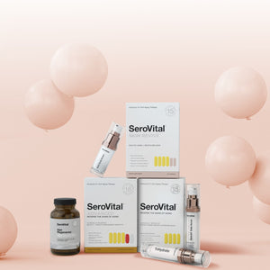 SeroVital skincare products on a soft pink background with floating bubbles