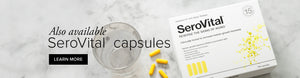 A box of HGH booster SeroVital lying on a marble background with 4 yellow capsules and a glass of water