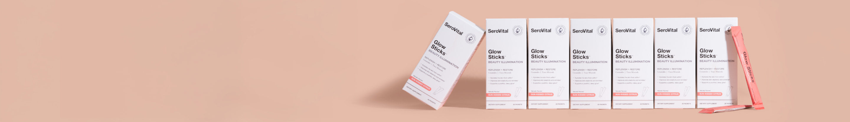 Row of skincare product boxes on a beige background