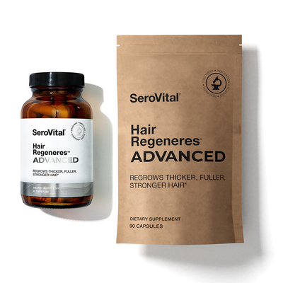 A glass bottle of women's hair loss formula Hair Regeneres ADVANCED next to a brown refill packet on a white background