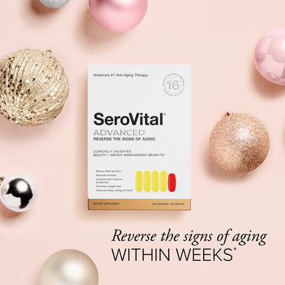 SeroVital ADVANCED dietary supplement packaging on a festive background with holiday ornaments.