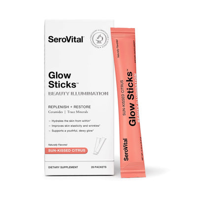 A box of SeroVital Glow Sticks beauty illumination powder for glowing skin with a Sun-Kissed Citrus packet leaning against it