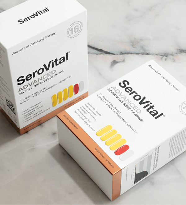 Boxes of SeroVital ADVANCED supplements on a marble surface, promoting anti-aging and weight management benefits with colorful pill illustrations on the packaging.