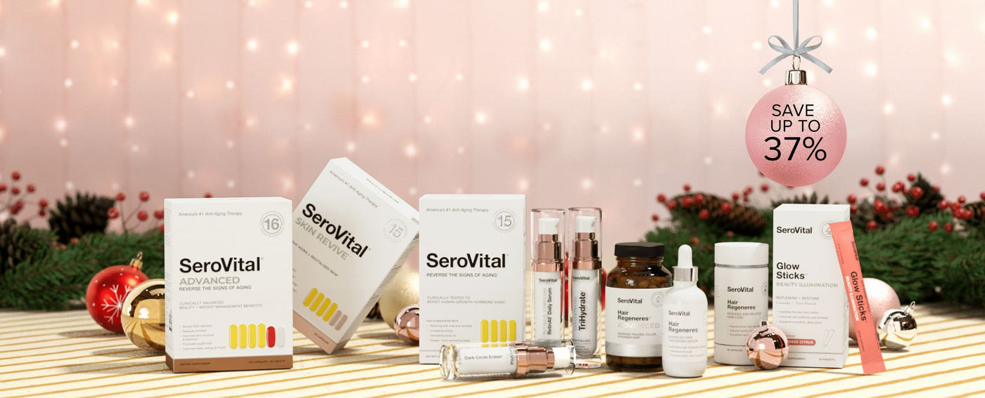 Serovital Advanced, Skin Revive, Hair Regeneres, and Glow Sticks products in a festive holiday display with pinecones and ornaments.