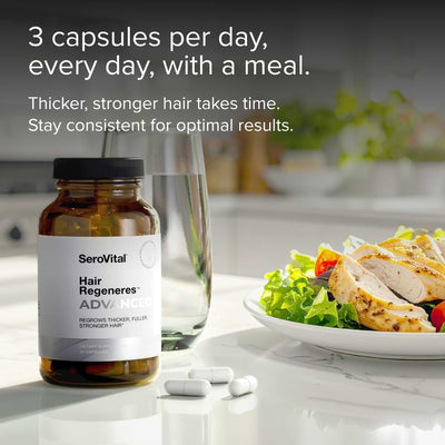 SeroVital Hair Regeneres Advanced bottle next to a glass of water and a meal of chicken and salad, illustrating the dosing instruction: 3 capsules per day, every day, with a meal.