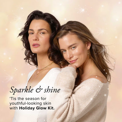 Two women posing together with a promotional message for a holiday glow kit
