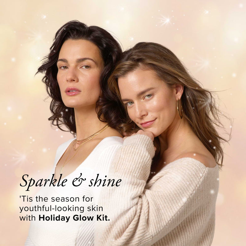 Two women posing together with a promotional message for a holiday glow kit