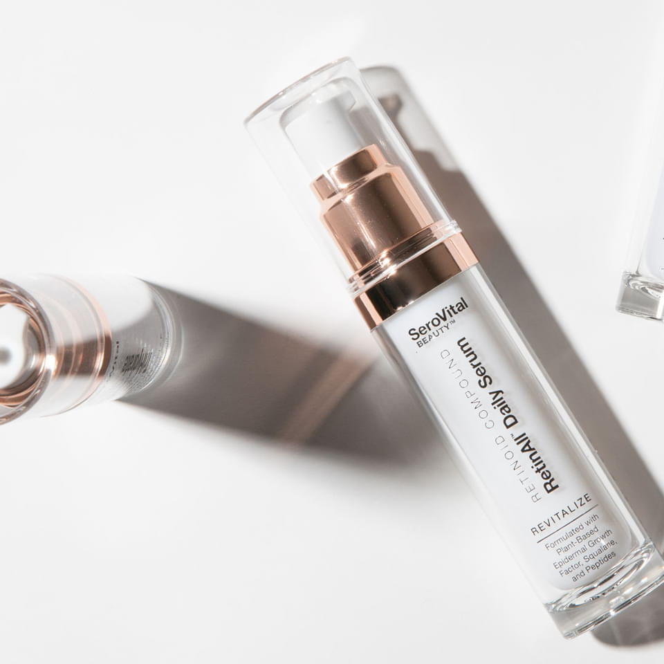 Two tubes of RetinAll Daily Serum on a white background