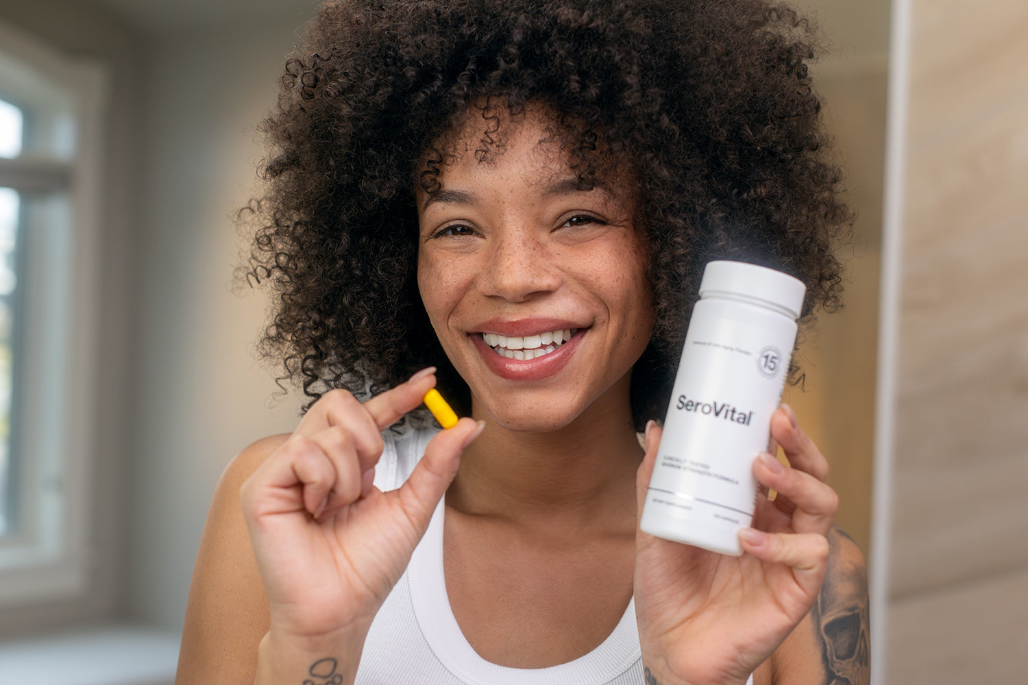 Woman holding a bottle labeled 'SecoVital' and a small container.