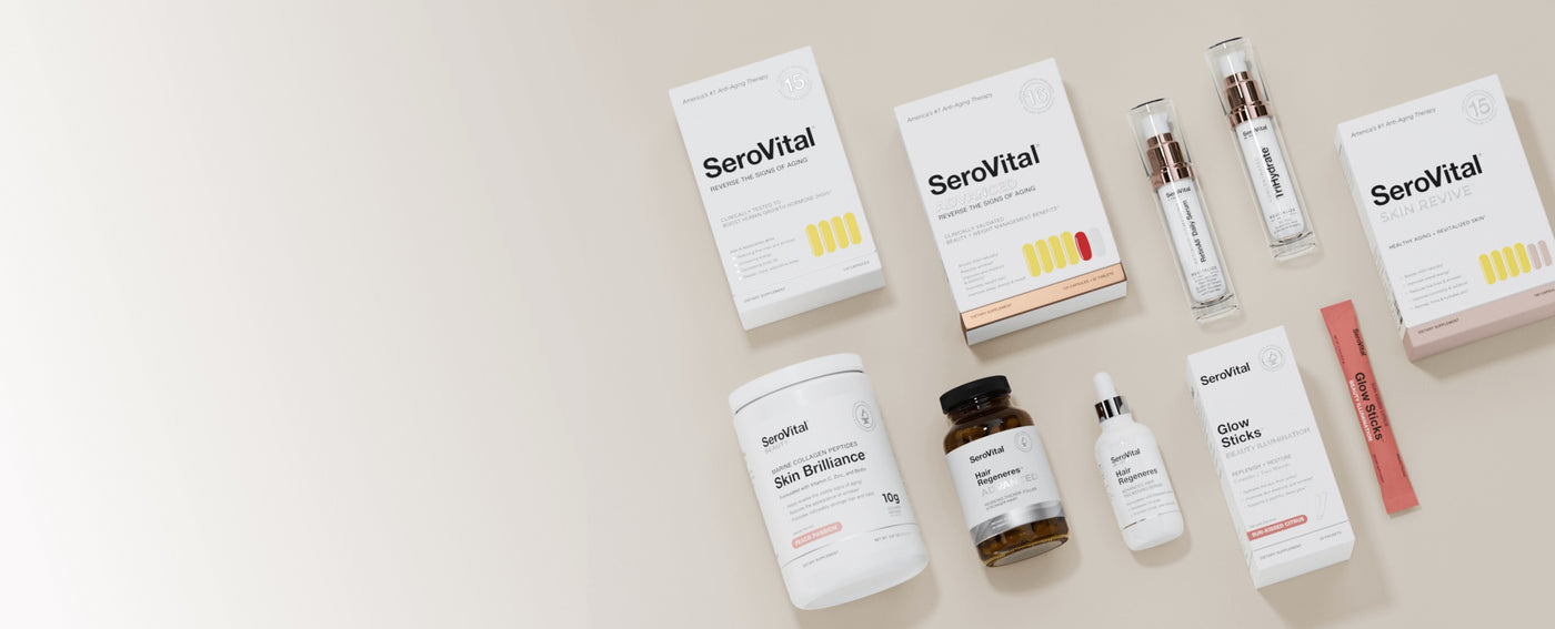 A flat lay of various SeroVital anti-aging and skin health products, including boxes, bottles, a tub, and individual packets, on a neutral background.