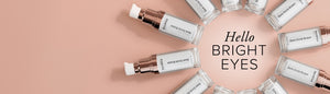 SeroVital Dark Circle Eraser eye cream products arranged around text "Hello BRIGHT EYES" on a light pink background.