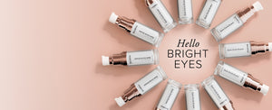 SeroVital Dark Circle Eraser eye cream products arranged around text "Hello BRIGHT EYES" on a light pink background.