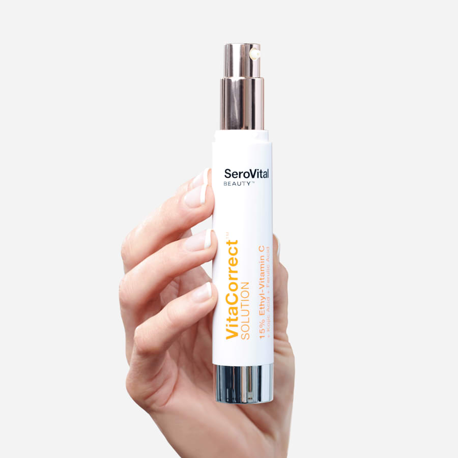 VitaCorrect tube help up in hand.